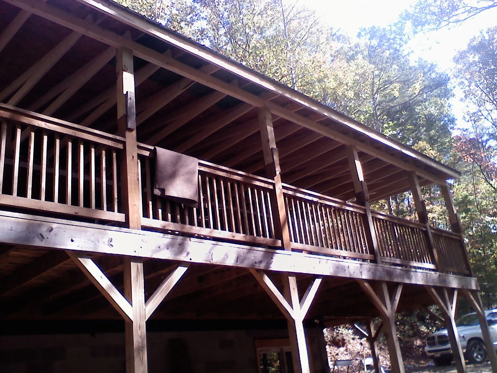 Timber framing under a new elevated porch and deck — Roof Leak Repair in Masonville by Roofing Brothers